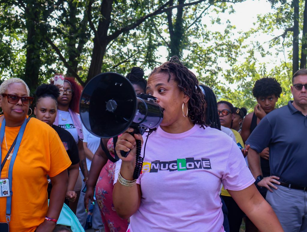 A woman on a megaphone