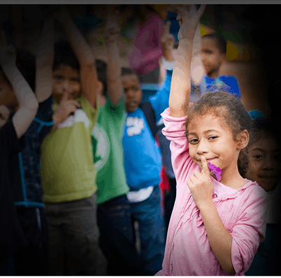 Family Services – child with arm in the air